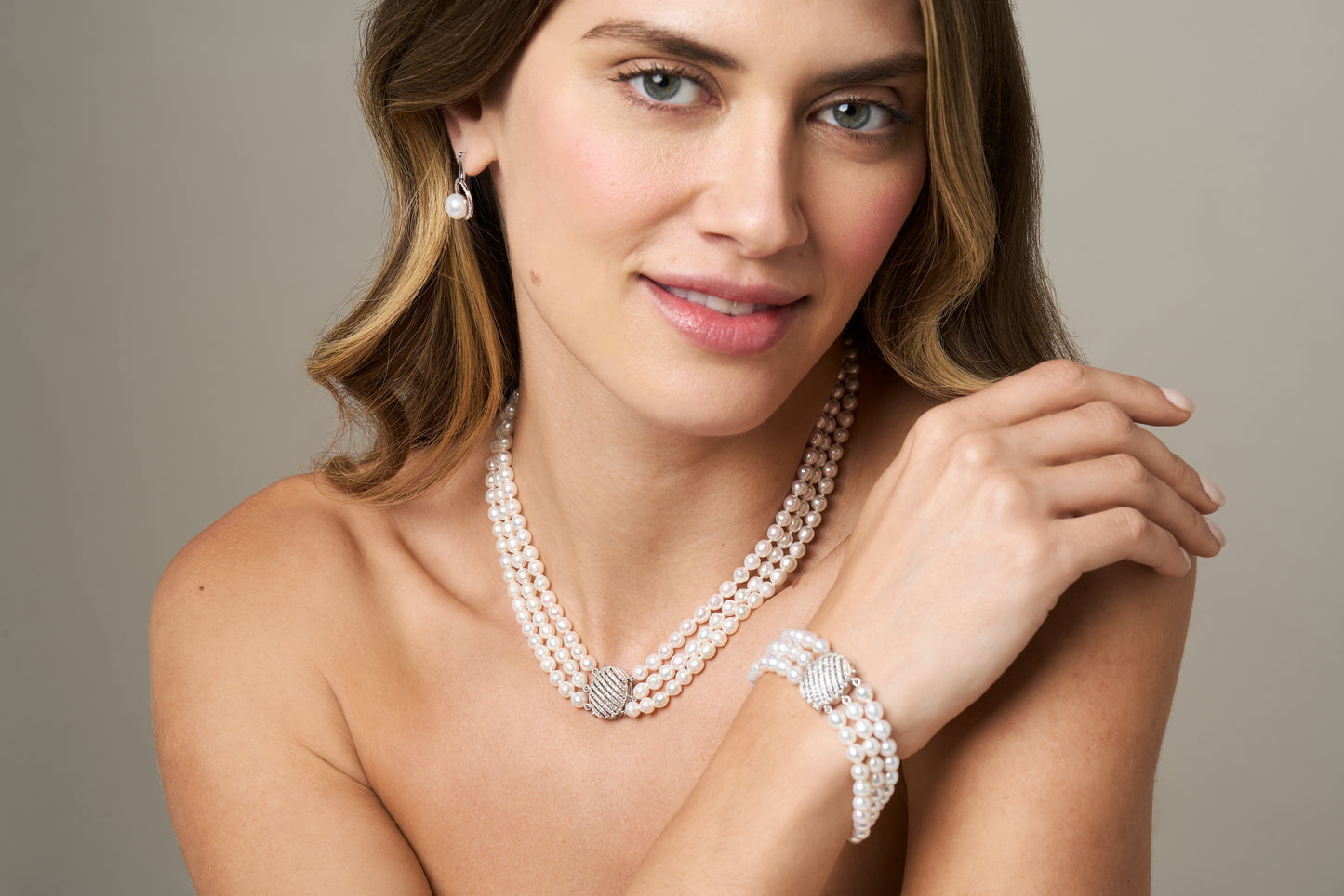 Stella triple strand cultured freshwater pearl necklace with vintage style oval pave clasp