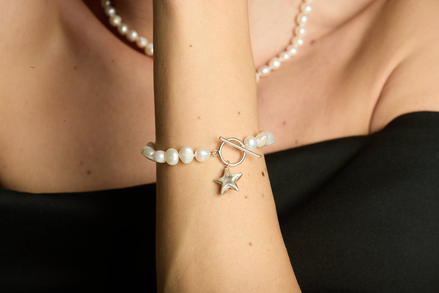 Stella cultured freshwater irregular pearl bracelet with a sterling silver star charm