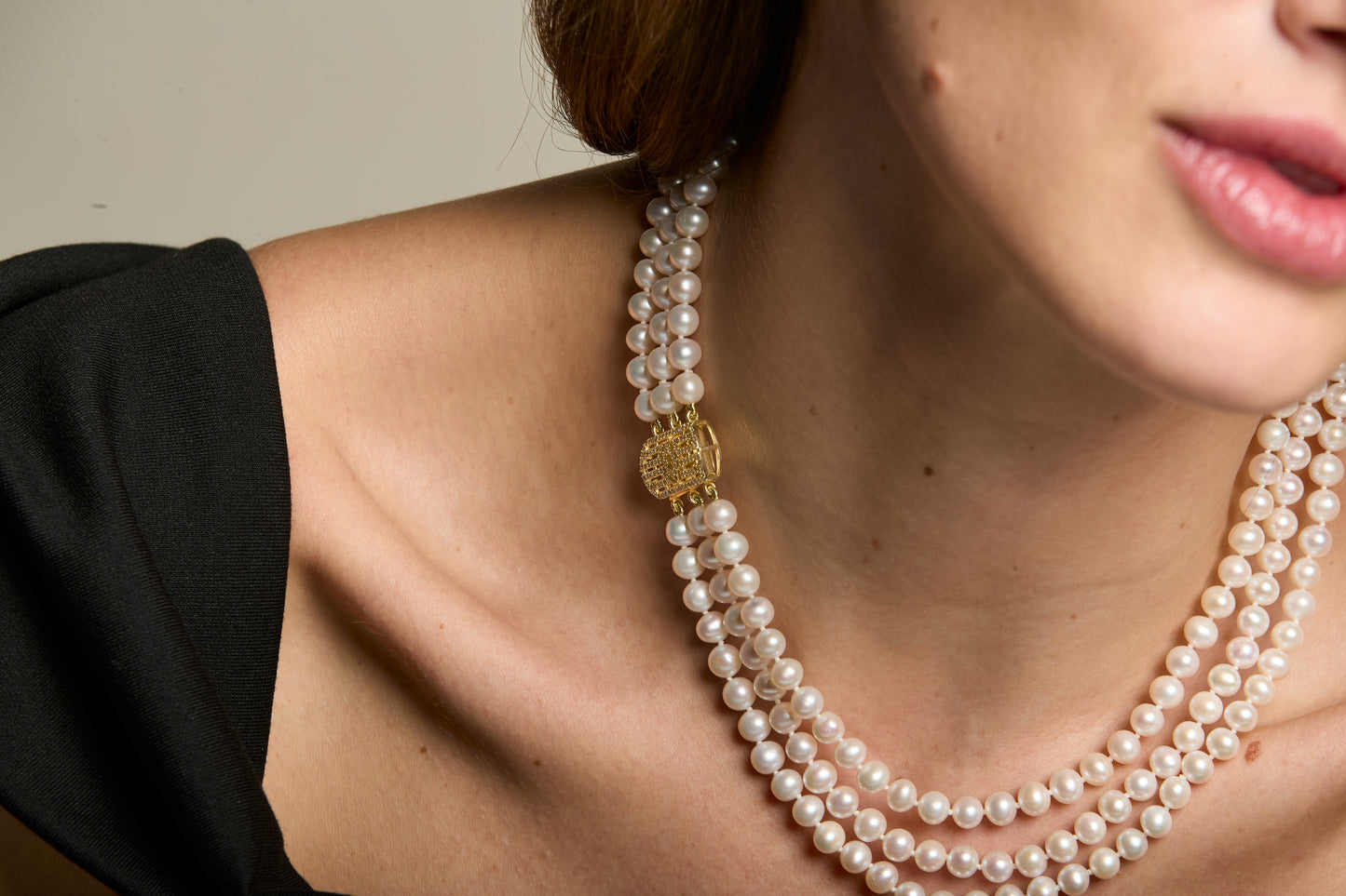 Stella triple strand cultured freshwater pearl necklace with art deco style gold vermeil pave clasp
