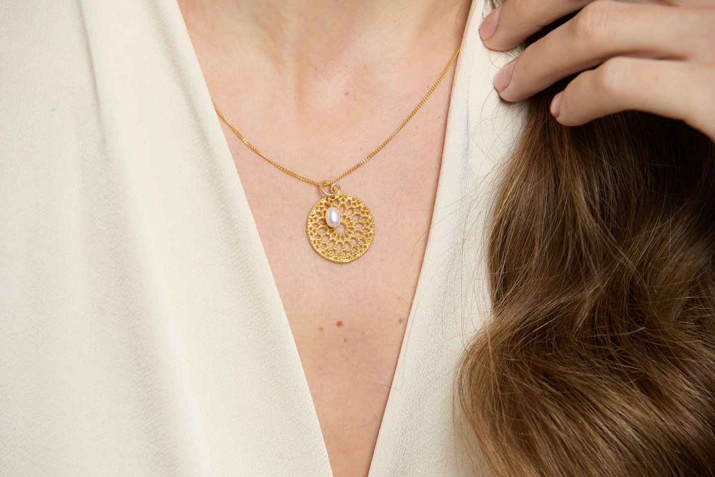 Credo disk pendant with cultured freshwater pearl drop