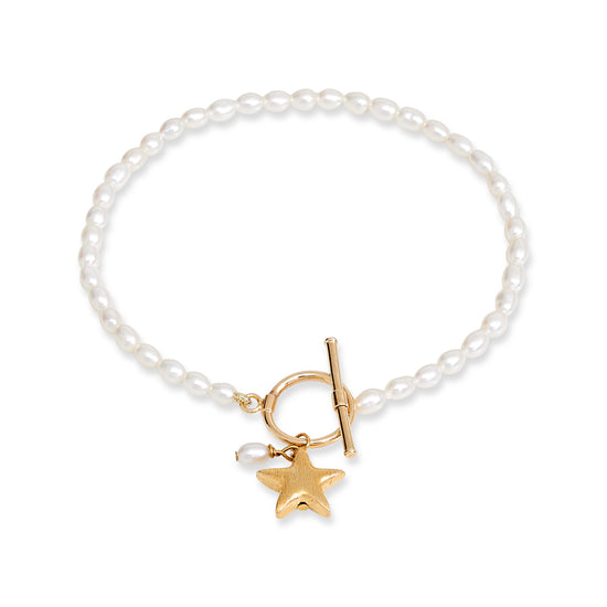 Stella cultured freshwater oval pearl bracelet with a gold-plated star charm
