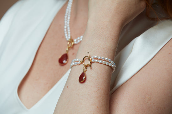 Clara double-strand cultured freshwater pearl bracelet with ruby quartz drop pendant