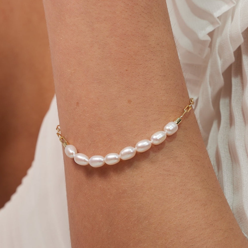 
                  
                    Credo gold link chain bracelet with cultured freshwater pearls
                  
                