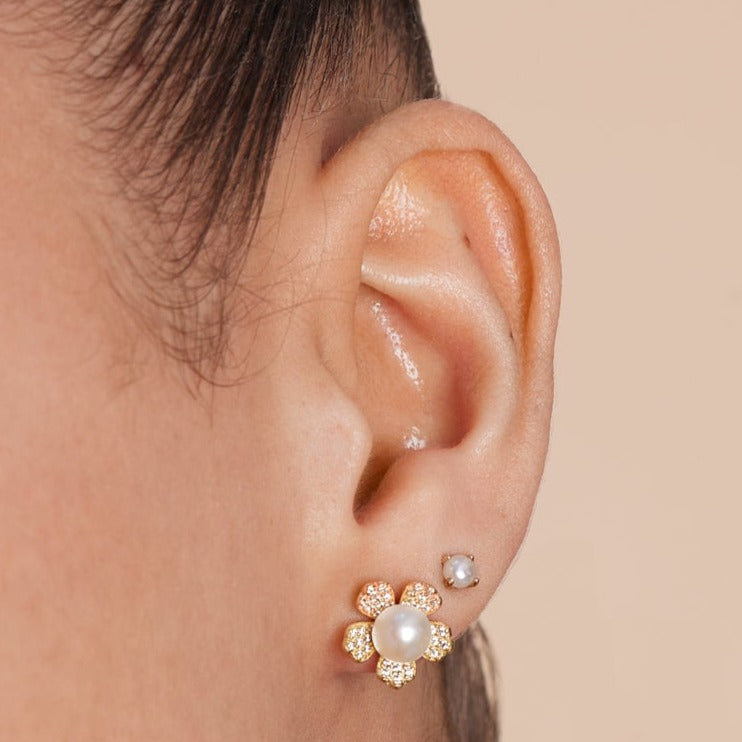 
                  
                    Stella gold sparkle flower studs with cultured freshwater pearls
                  
                