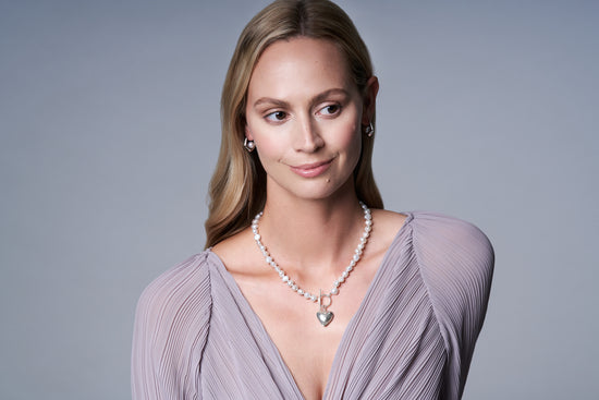 Load image into Gallery viewer, Amare single strand white irregular cultured freshwater pearl necklace with silver hammered heart
