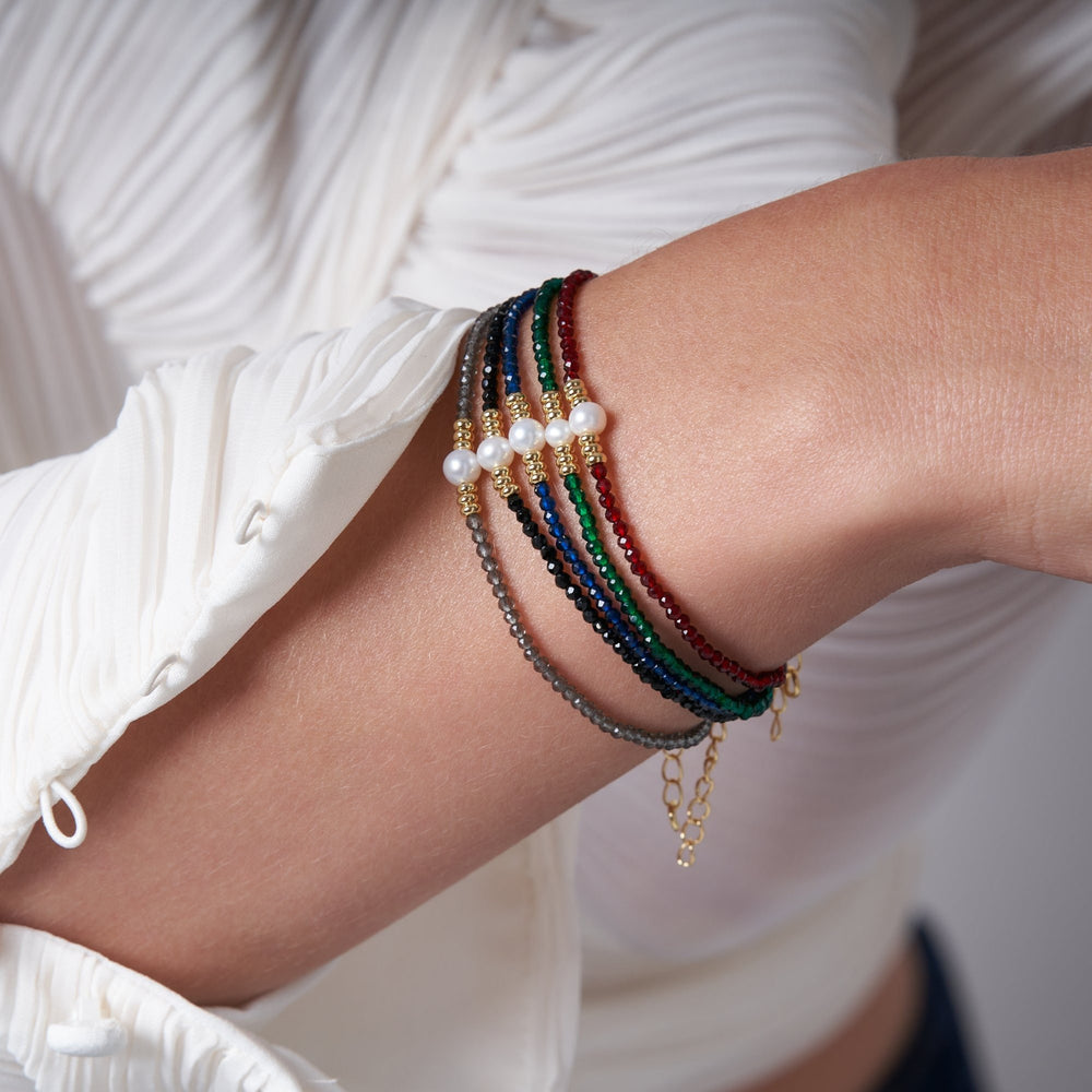 
                  
                    Clara fine blue spinel bracelet with central cultured freshwater pearl
                  
                