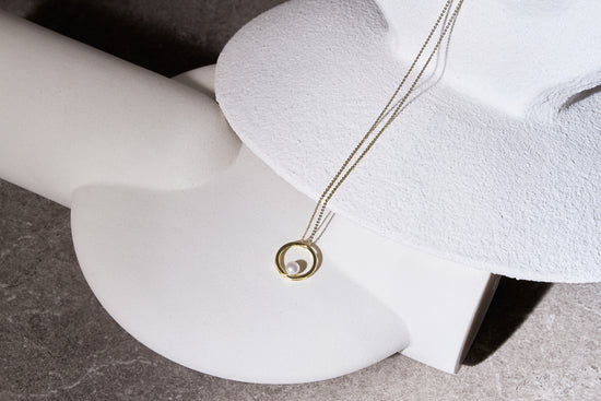 Credo gold circle pendant with cultured freshwater pearl