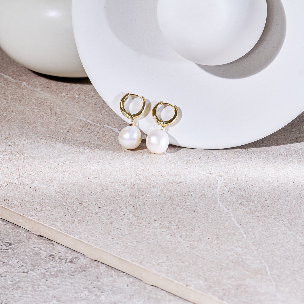 
                  
                    Credo chunky gold hoop earrings with baroque cultured freshwater pearls
                  
                