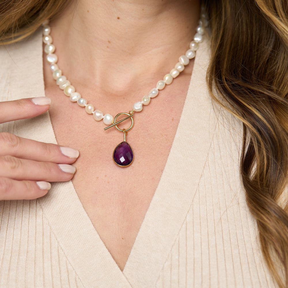 
                  
                    Clara cultured irregular freshwater pearl necklace with amethyst gold vermeil drop
                  
                