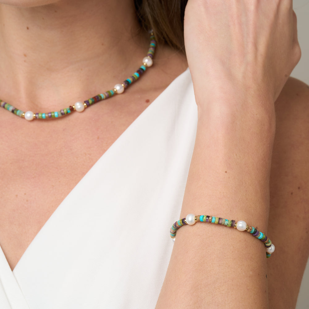 
                  
                    Nova oval cultured freshwater pearl bracelet with blue mix jasper & gold beads
                  
                
