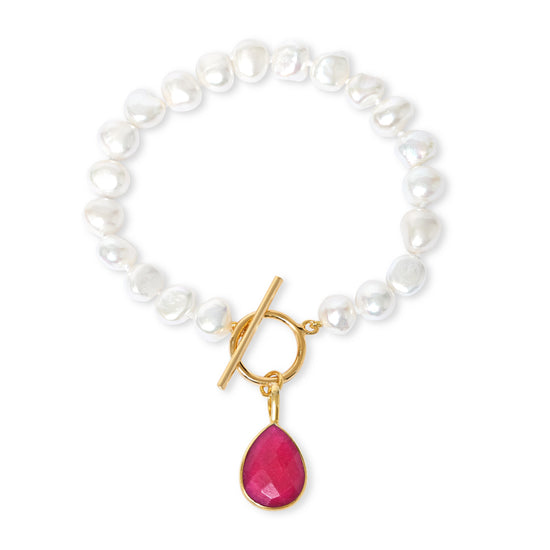 Clara white cultured freshwater pearl bracelet with a ruby quartz drop pendant