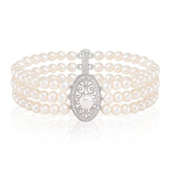 Gratia triple strand cultured freshwater pearl bracelet with vintage style oval pave feature
