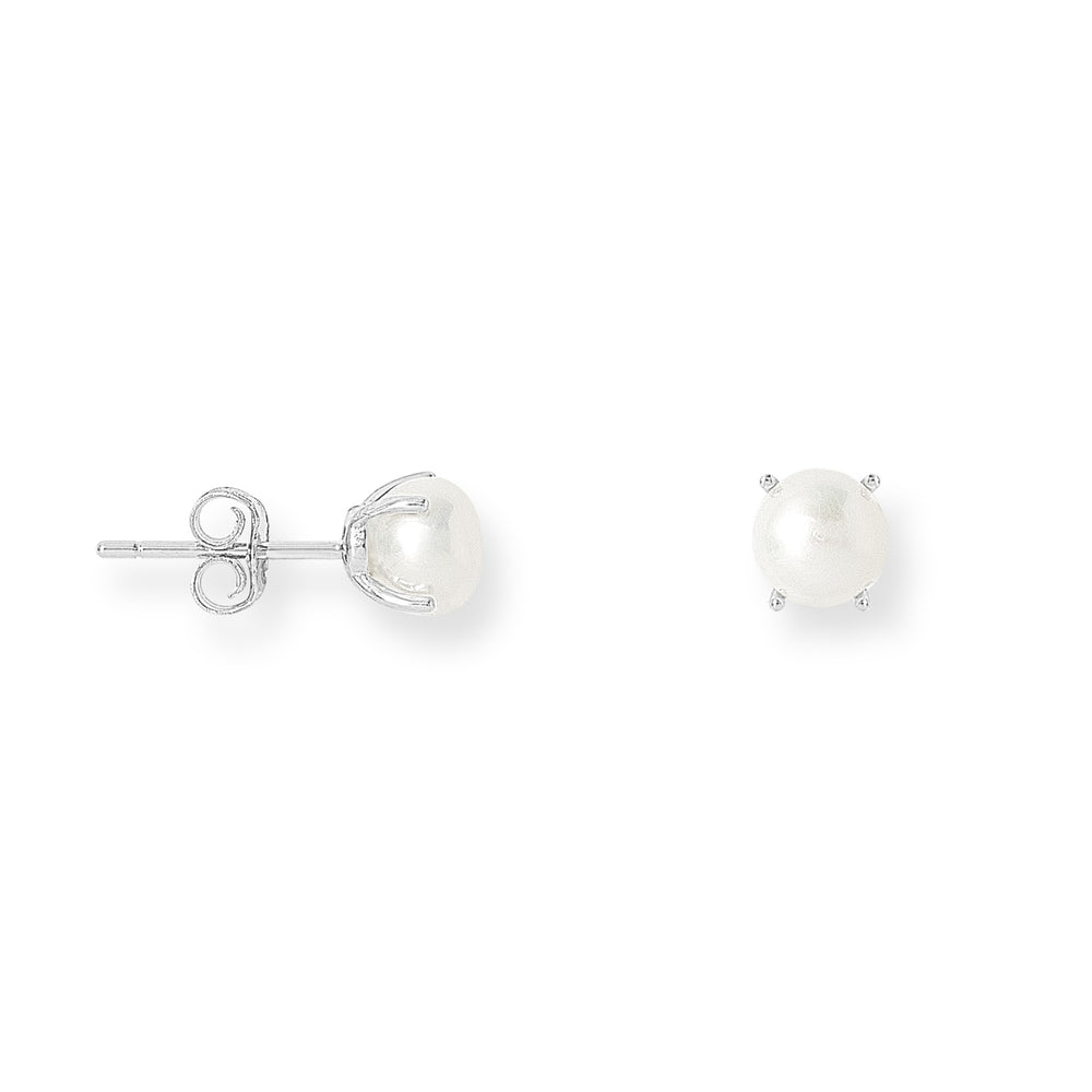 Margarita white cultured freshwater pearl stud earrings in silver claw settings