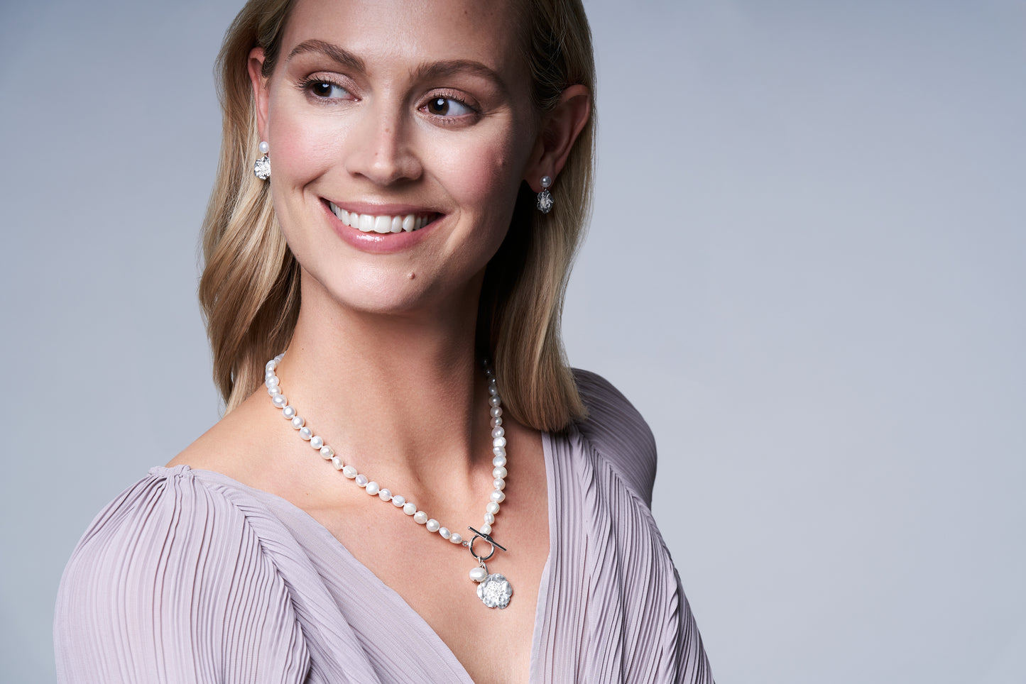 Load image into Gallery viewer, Vita cultured Freshwater Pearl Necklace with Silver Cherry Blossom Charm
