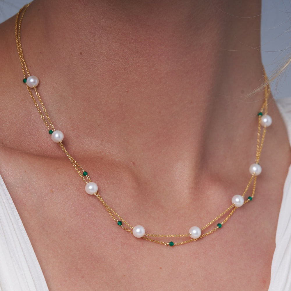 
                  
                    Credo fine double chain necklace with cultured freshwater pearls & emerald
                  
                