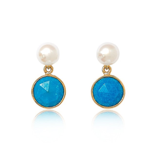 Pair of earrings with cultured freshwater pearls and turquoise gemstones on  a white background