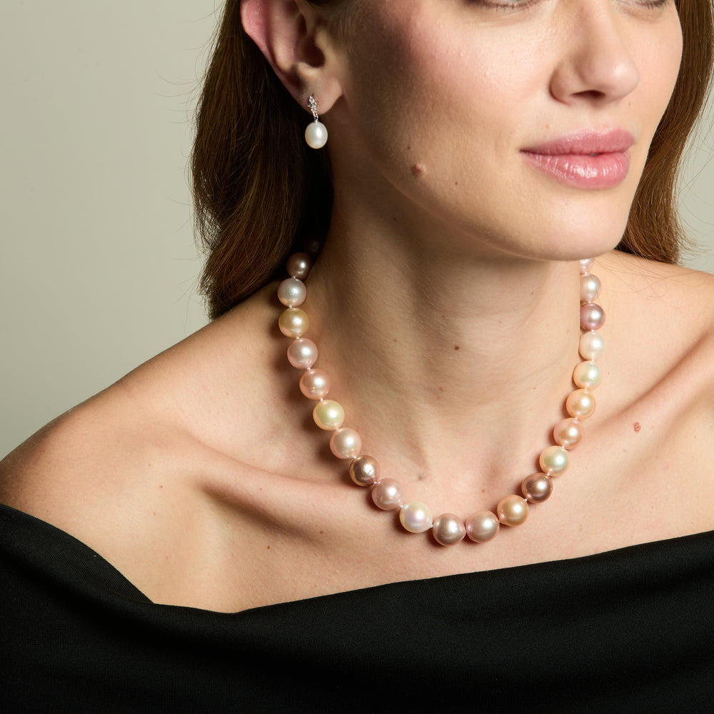 
                  
                    Gratia 11-13mm pinks & white cultured freshwater pearl necklace with silver spring clasp
                  
                