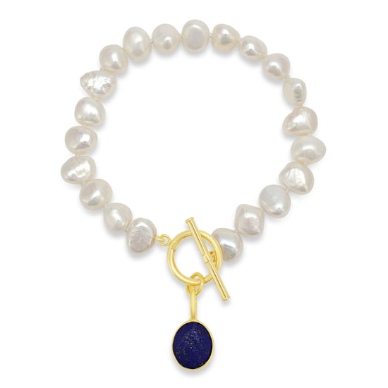 Load image into Gallery viewer, Clara white irregular cultured freshwater pearl bracelet with a lapis lazuli drop pendant
