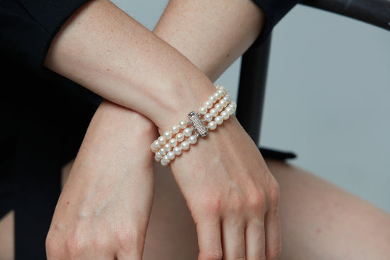 Stella triple strand cultured freshwater pearl bracelet with vintage style pave clasp