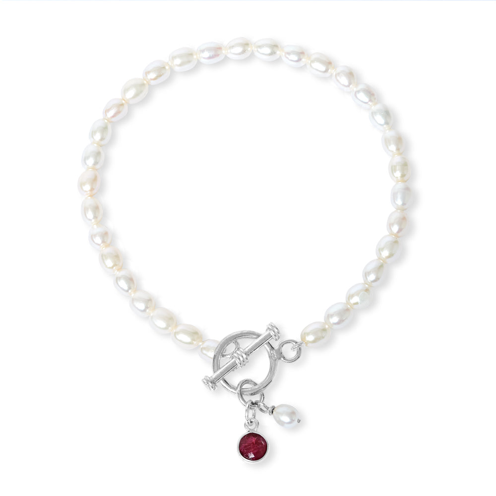 Load image into Gallery viewer, Clara cultured freshwater pearl bracelet with ruby pendant
