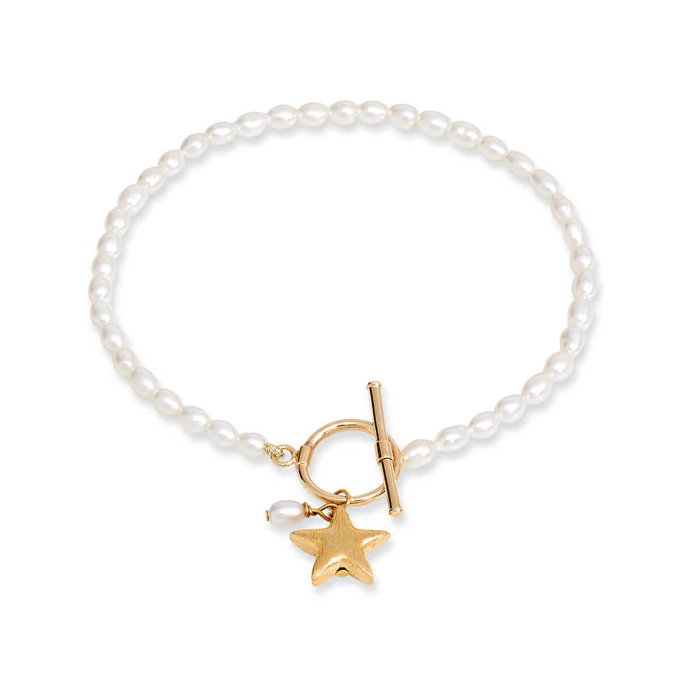 Load image into Gallery viewer, Stella cultured freshwater oval pearl bracelet with a gold-plated star charm
