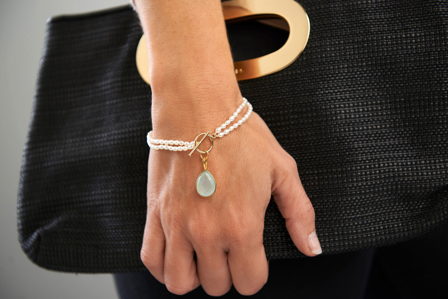 Clara double-strand pearl bracelet with an aqua chalcedony drop pendant
