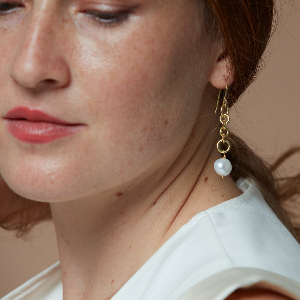 
                  
                    Decus baroque cultured freshwater pearl drop earrings on chunky gold chain
                  
                