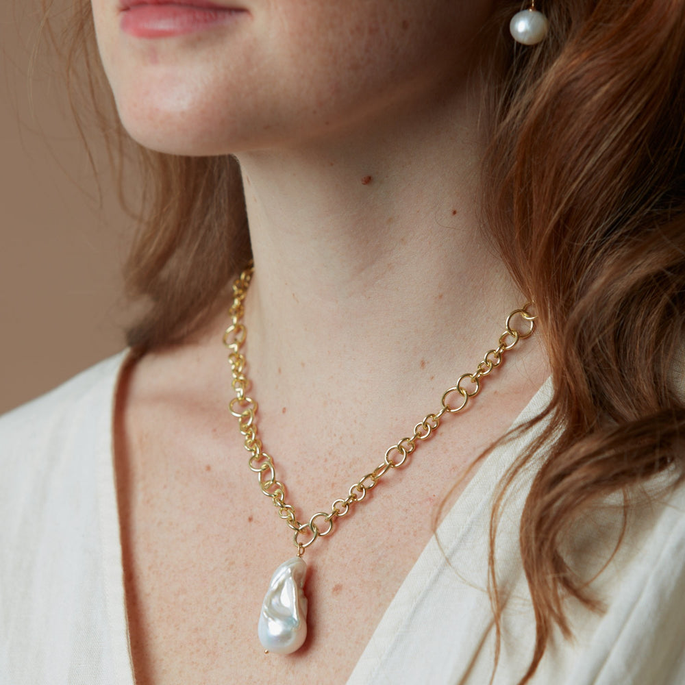 
                  
                    Decus large baroque 'fireball' cultured freshwater pearl drop on chunky gold chain
                  
                
