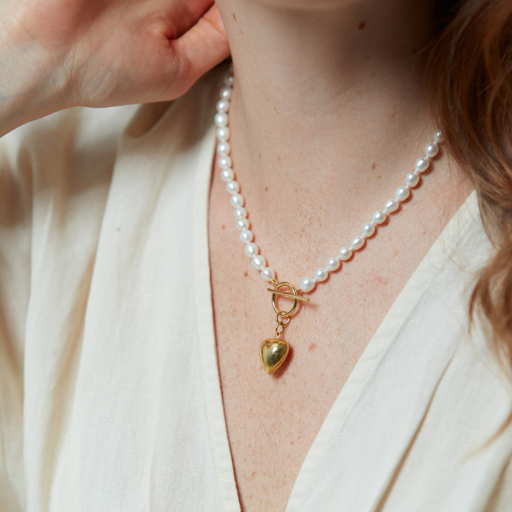
                  
                    Amare oval cultured freshwater pearl bracelet with gold vermeil heart
                  
                