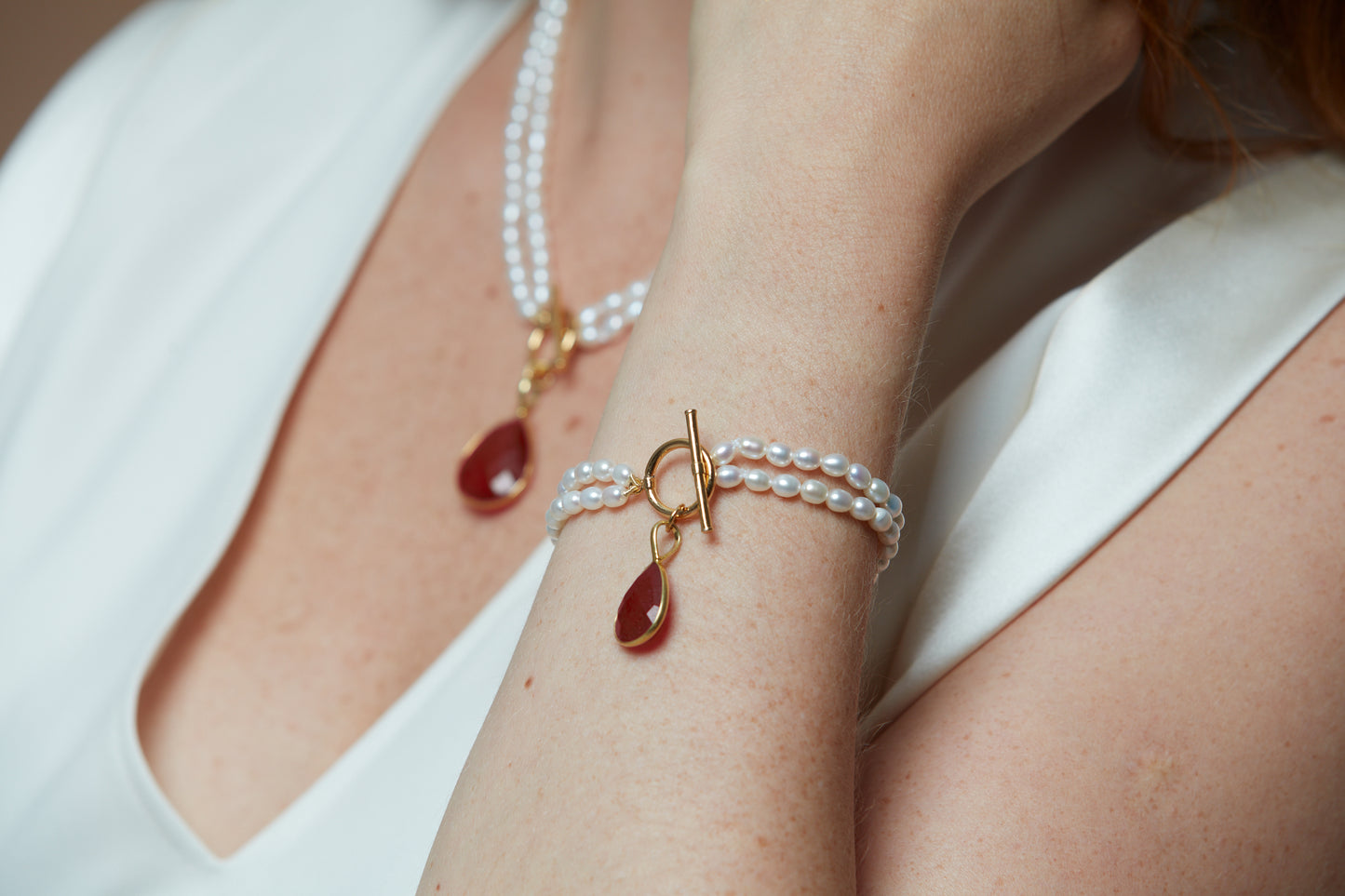 Load image into Gallery viewer, Clara double-strand cultured freshwater pearl bracelet with ruby quartz drop pendant
