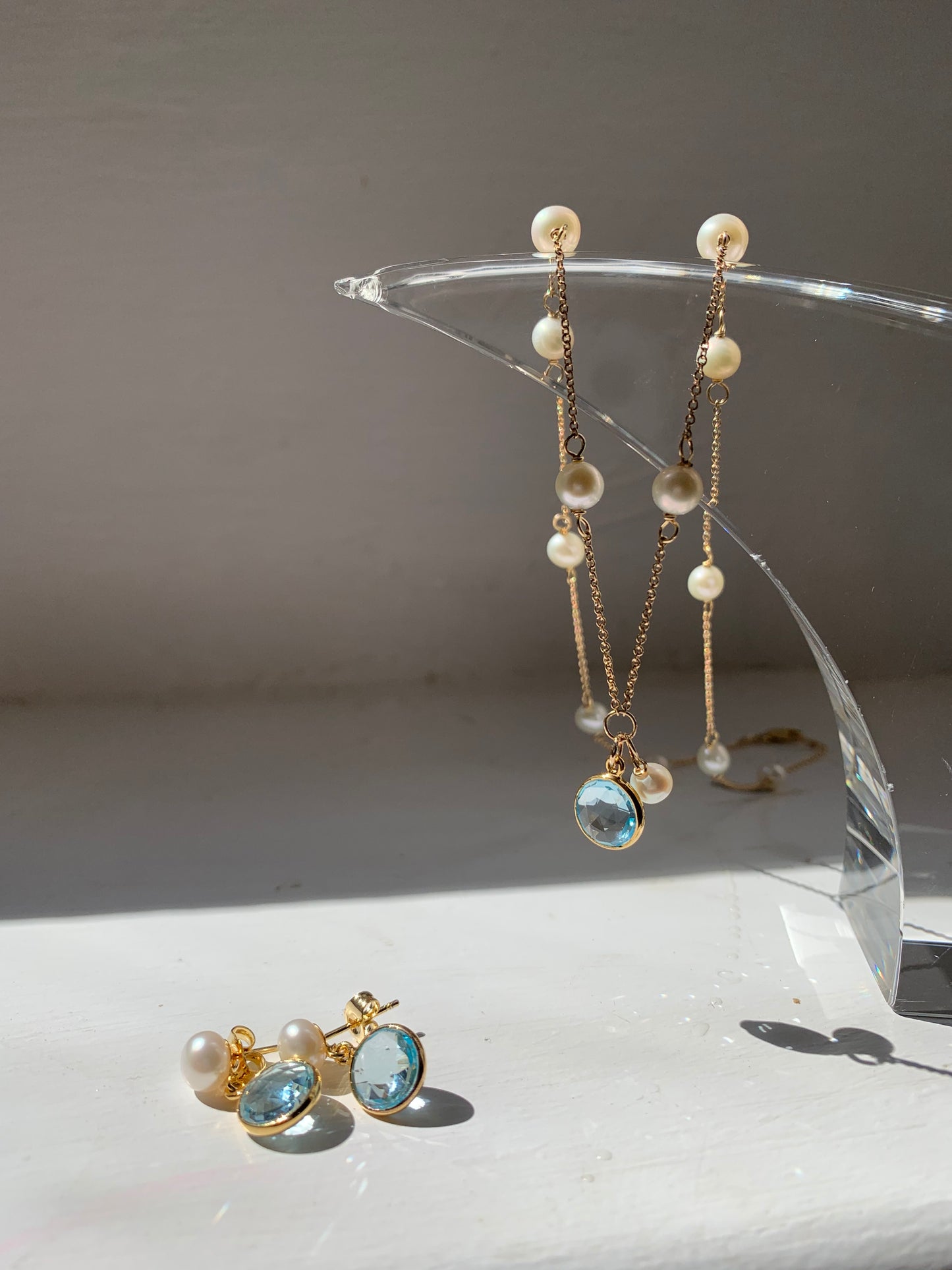 Load image into Gallery viewer, Nova fine chain necklace with cultured freshwater pearls &amp;amp; blue topaz drop
