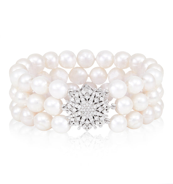Load image into Gallery viewer, Stella triple strand cultured freshwater pearl bracelet with a sparkle star clasp
