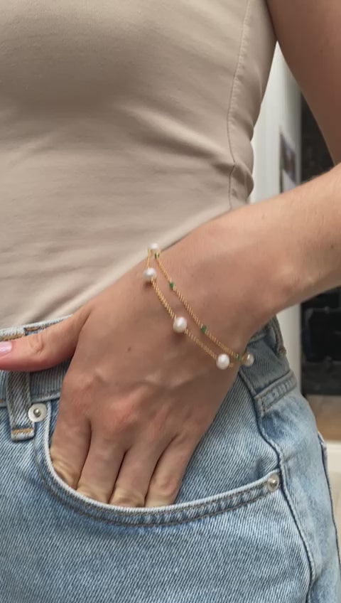 Load and play video in Gallery viewer, Credo fine double chain bracelet with cultured freshwater pearls &amp;amp; emerald
